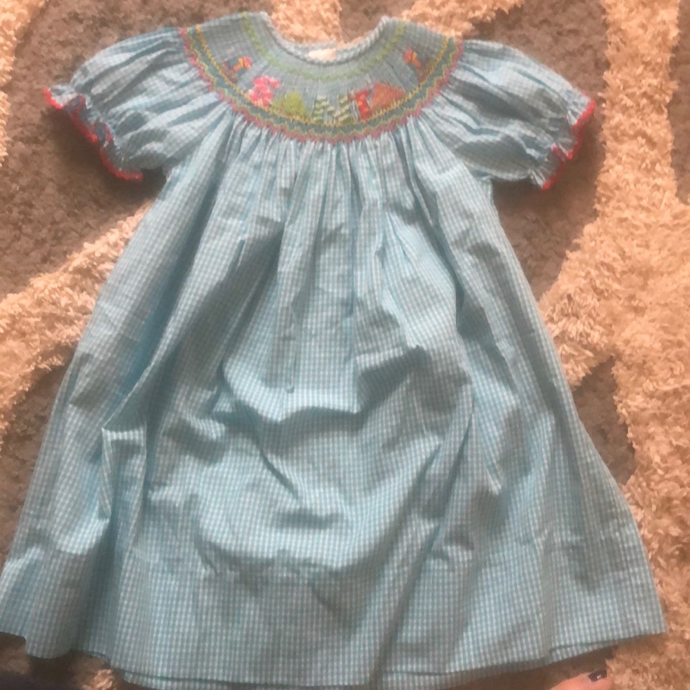 Smocked Santa dress. Size is 12m but fits 2T